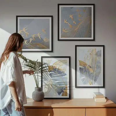 Set of 4 wall art pieces featuring blue and beige leaves on the background