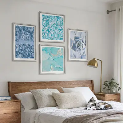 Multi-piece wall decor set featuring a winter forest and blue flower design