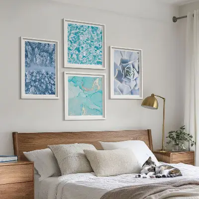 Multi-piece wall decor set featuring a winter forest and blue flower design