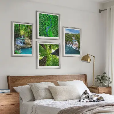 Multi-piece wall decor set featuring a green forest and waterfall landscape