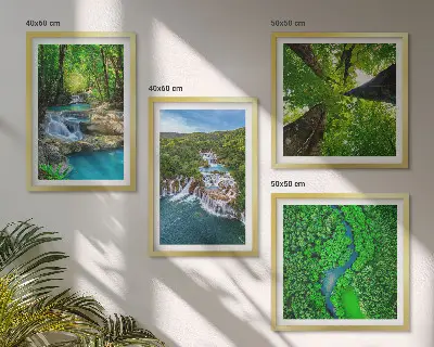Multi-piece wall decor set featuring a green forest and waterfall landscape