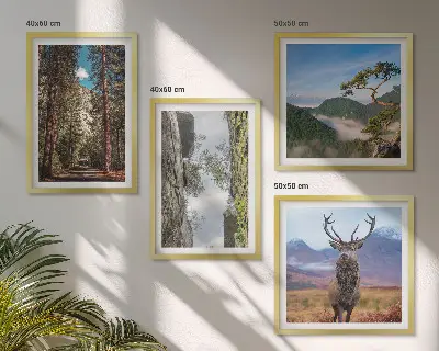 Set of 4 wall art pieces featuring a road forest mountains and deer nature theme