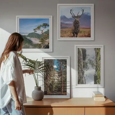 Set of 4 wall art pieces featuring a road forest mountains and deer nature theme