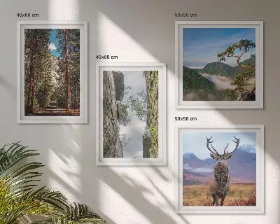 Set of 4 wall art pieces featuring a road forest mountains and deer nature theme