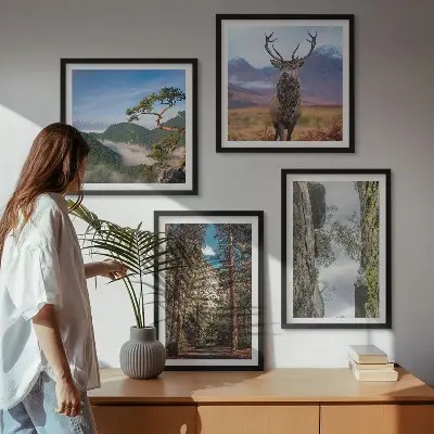 Set of 4 wall art pieces featuring a road forest mountains and deer nature theme