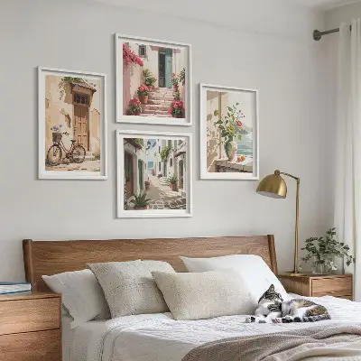 Set of 4 wall art pieces featuring painted streets with flowers and a bicycle