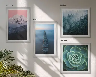 Wall art set mountains with a pink sky over succulent plants and water