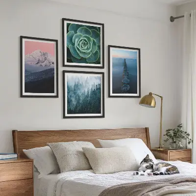 Wall art set mountains with a pink sky over succulent plants and water