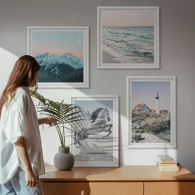 Set of 4 wall art pieces featuring horses in motion on a beach with a lighthouse and mountain landscape