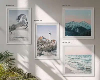 Set of 4 wall art pieces featuring horses in motion on a beach with a lighthouse and mountain landscape