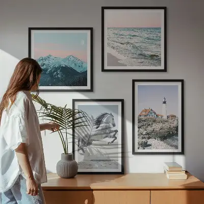 Set of 4 wall art pieces featuring horses in motion on a beach with a lighthouse and mountain landscape