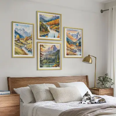 Set of 4 wall art pieces featuring a mountain landscape with a river and cottages