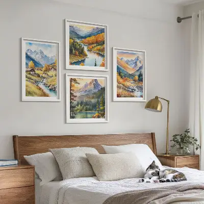 Set of 4 wall art pieces featuring a mountain landscape with a river and cottages