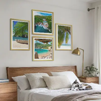Multi-piece wall art set featuring beach, boat, waterfalls, and palm trees