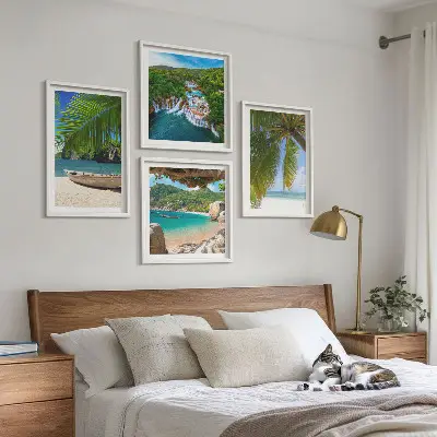 Multi-piece wall art set featuring beach, boat, waterfalls, and palm trees
