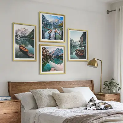 Wall art set featuring a lake, mountains, boats, and a cottage