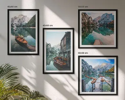 Wall art set featuring a lake, mountains, boats, and a cottage