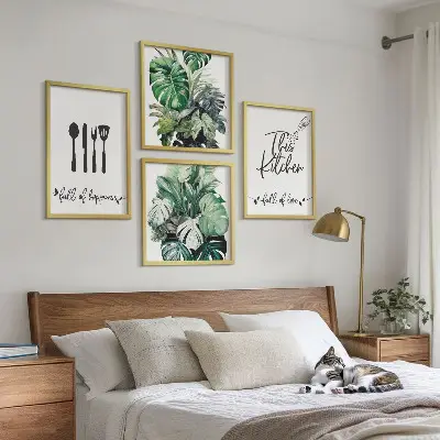 Wall art set featuring kitchen utensil and leaf patterns