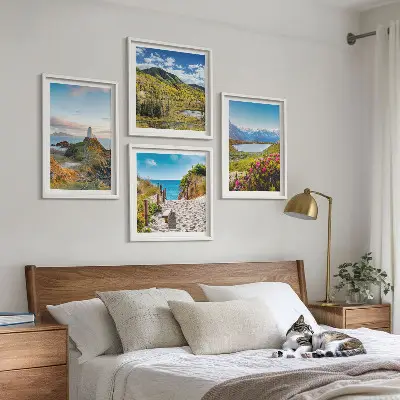 Set of 4 wall art pieces featuring beach, lighthouse, mountains, meadows, and flowers