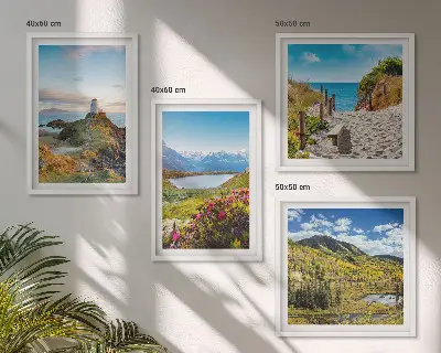 Set of 4 wall art pieces featuring beach, lighthouse, mountains, meadows, and flowers