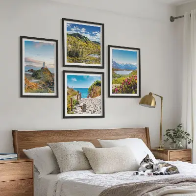 Set of 4 wall art pieces featuring beach, lighthouse, mountains, meadows, and flowers
