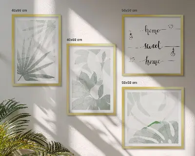 Wall art set with a greenish-gray plant leaves design
