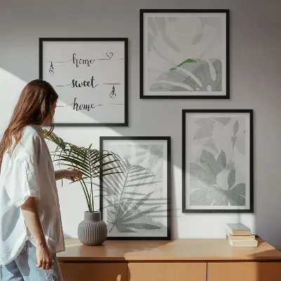 Wall art set with a greenish-gray plant leaves design