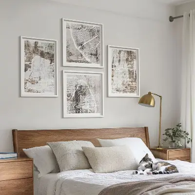 Multi-piece wall decor set with abstract patterns in white and brown