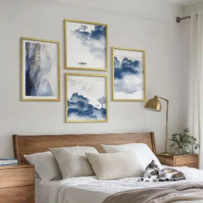 Multi-piece wall decor set featuring a mountain landscape with clouds trees and birds