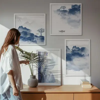 Multi-piece wall decor set featuring a mountain landscape with clouds trees and birds