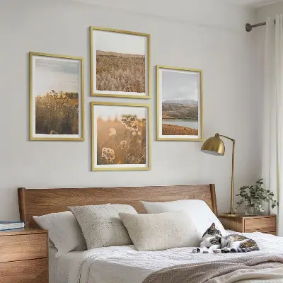 Set of 4 wall art pieces featuring landscape scenes of meadows mountains and a lake