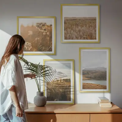 Set of 4 wall art pieces featuring landscape scenes of meadows mountains and a lake