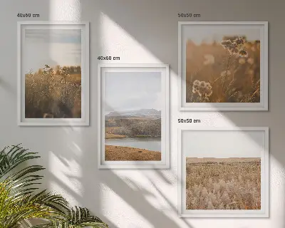 Set of 4 wall art pieces featuring landscape scenes of meadows mountains and a lake
