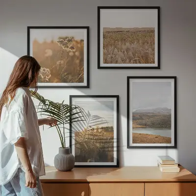 Set of 4 wall art pieces featuring landscape scenes of meadows mountains and a lake