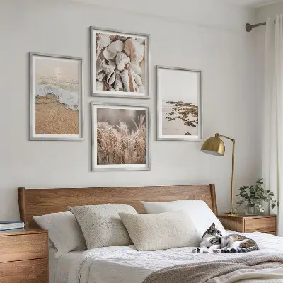 Set of 4 boho beach wall art pieces featuring grass, waves, and stones