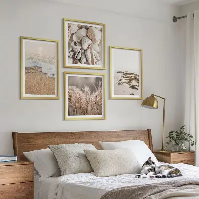 Set of 4 boho beach wall art pieces featuring grass, waves, and stones