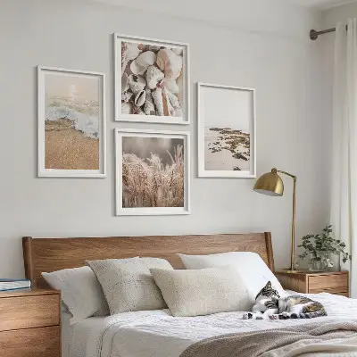 Set of 4 boho beach wall art pieces featuring grass, waves, and stones