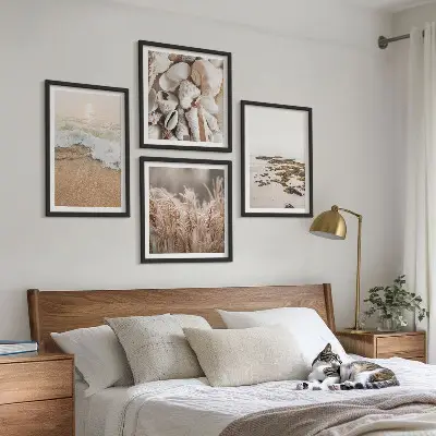 Set of 4 boho beach wall art pieces featuring grass, waves, and stones