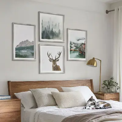 Multi-piece wall decor set featuring mountains, a lake, deer, a cottage, and fog