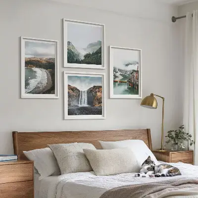 Multi-piece wall decor set featuring a mountain, beach, and cloud seascape