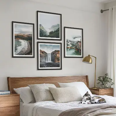 Multi-piece wall decor set featuring a mountain, beach, and cloud seascape