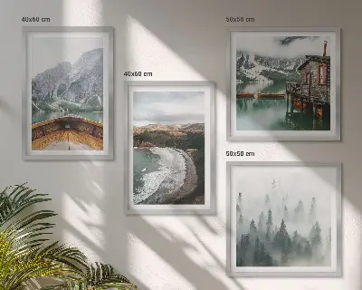 Set of 4 wall art pieces featuring mountains, a lake, a boat, fog, and a beach