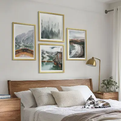 Set of 4 wall art pieces featuring mountains, a lake, a boat, fog, and a beach