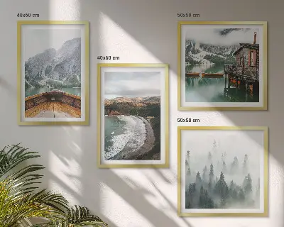 Set of 4 wall art pieces featuring mountains, a lake, a boat, fog, and a beach