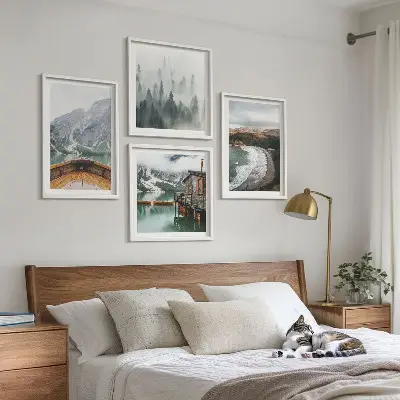 Set of 4 wall art pieces featuring mountains, a lake, a boat, fog, and a beach