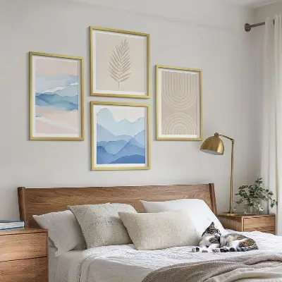 Set of 4 wall art pieces with beige and blue leaves and waves design