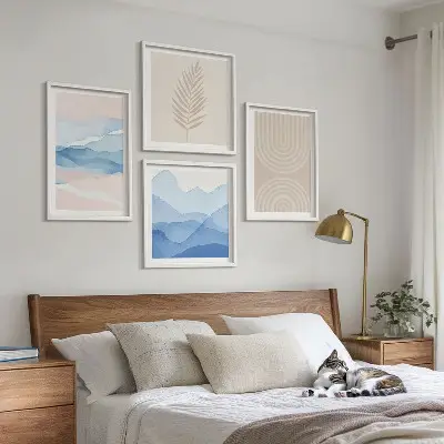Set of 4 wall art pieces with beige and blue leaves and waves design