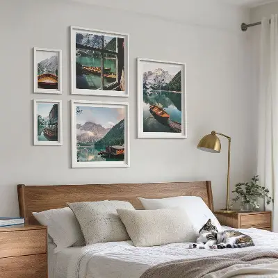 Framed photo set featuring landscapes of lakes, mountains, and boats