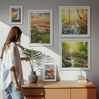 Gallery wall featuring landscapes of waterfalls and valleys