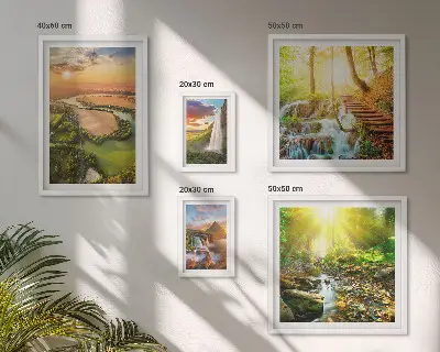 Gallery wall featuring landscapes of waterfalls and valleys